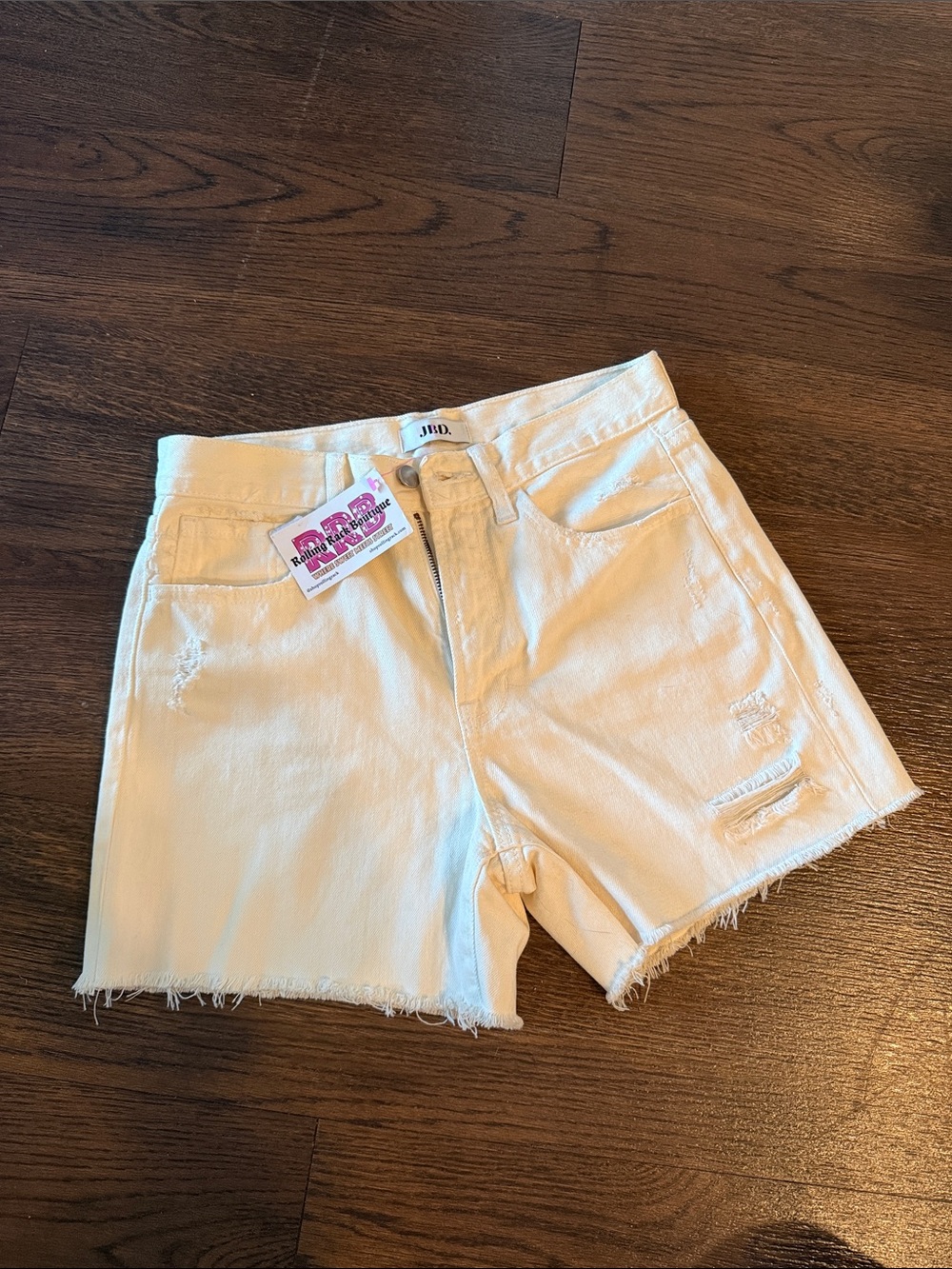 High-Rise White Distressed Jean Shorts —